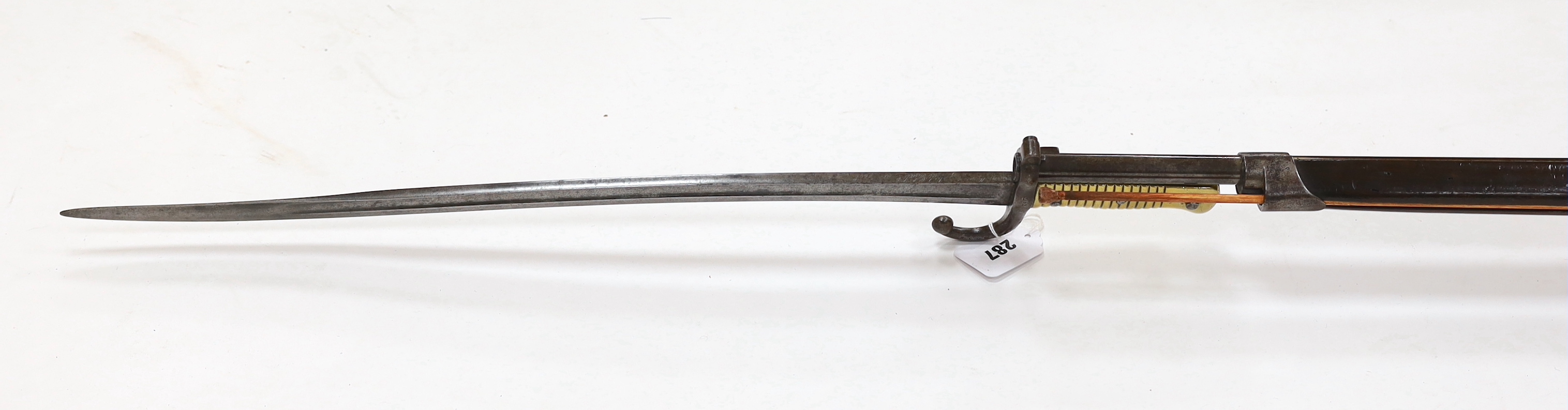 A French Chassepot bolt action rifle 1865-1874 with regulation, iron mounts, and 1868 brass handle bayonet dated 1868, barrel 79cm